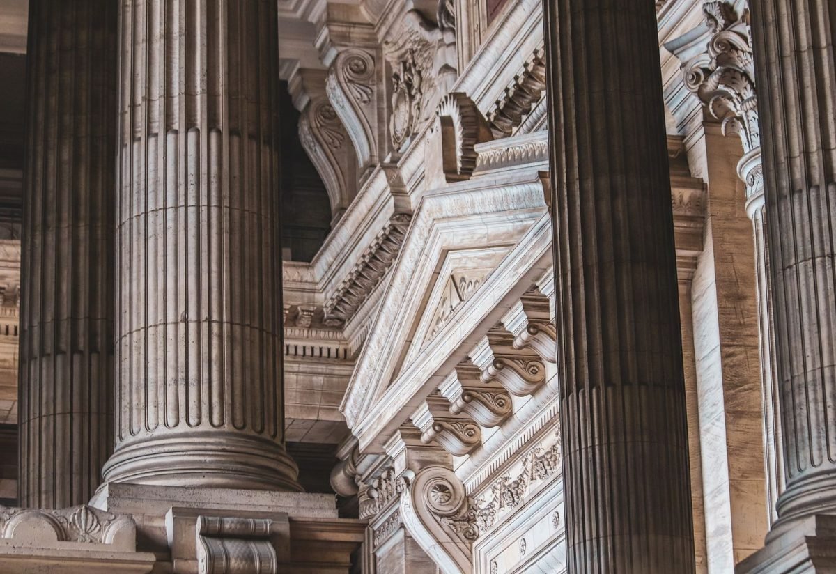 Neoclassical courthouse columns and carved stone detail