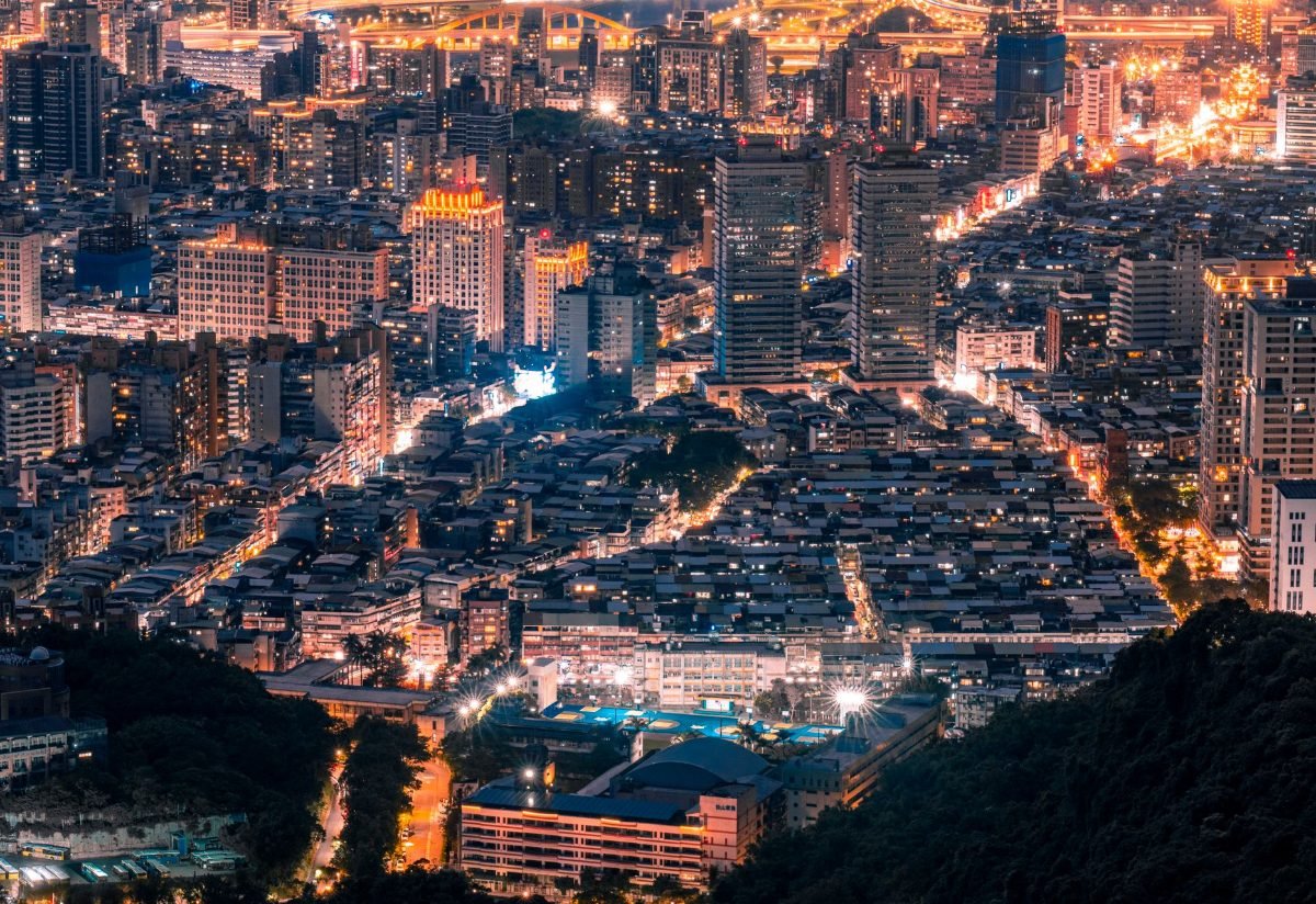 Aerial view of a city lit up at night